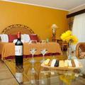 Отель Camino Real Suites