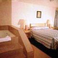Отель Downey Inn Luxury Suites