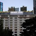 Отель Jockey Club Suites